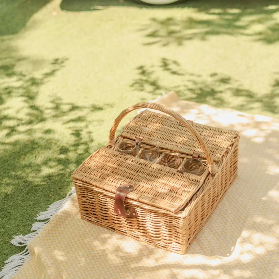 Family picnic basket and blanket ready for an outdoor adventure