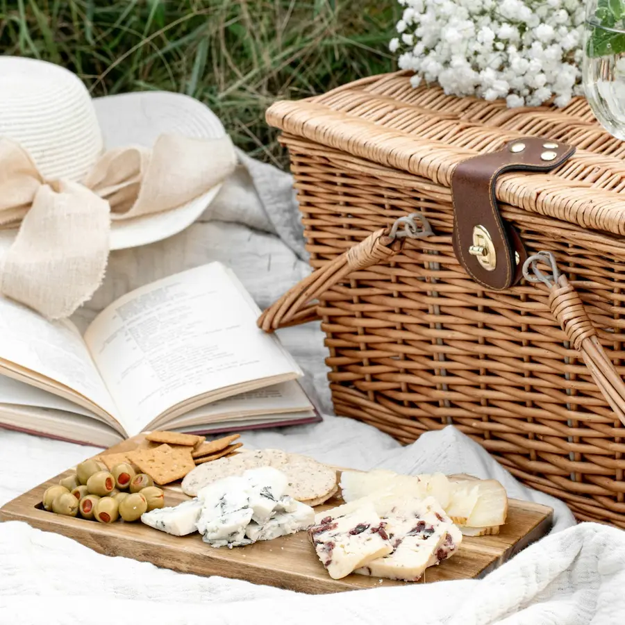 Solo picnic basket with local snacks and a blanket